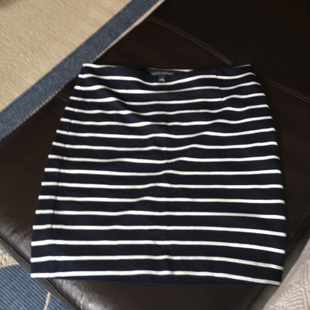 Short Rayon/Nylon/Spandex, side zipper skirt.